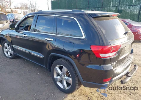 2013 Jeep Grand Cherokee Overland z USA, uszkodzony, nr VIN 1C4RJFCG7DC522421